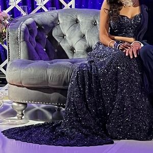 Stunning dark blue designer lehenga & train with heavy blue stone work